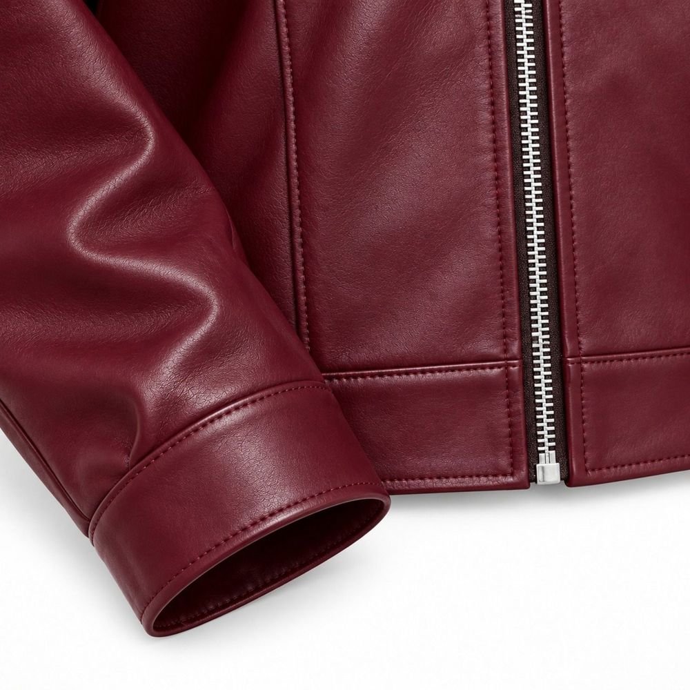 Cuff and hem detail with hand-finished edges